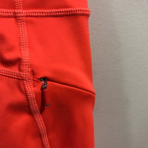 NWOT Athleta Neon Orange Laser Cut Leggings - Picture 4 of 6